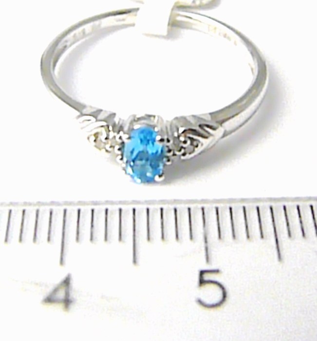 Klenoty Budín Zásnubní diamantový prsten s blue topaz 0,30ct, 6ks diamantů vel.57 3860450